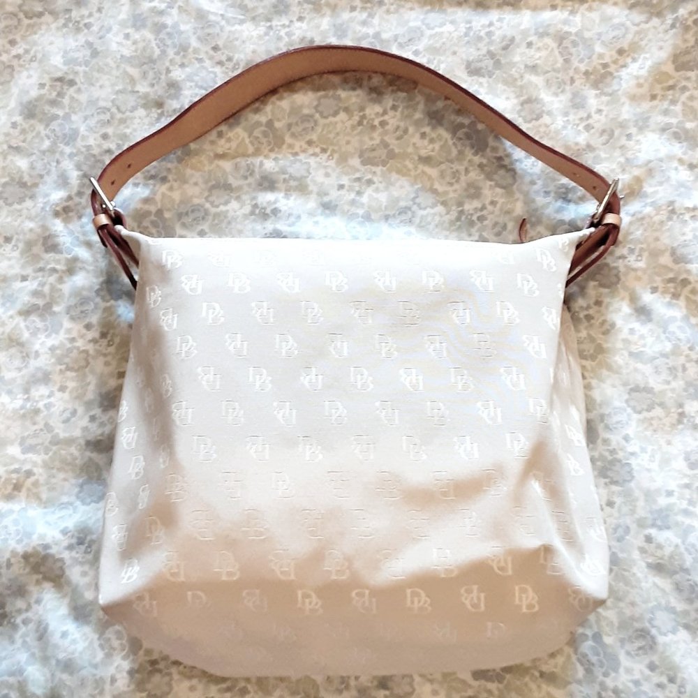 Lovely cream / off white /light taupe purse / handbag/ bucket bag from Dooney &
